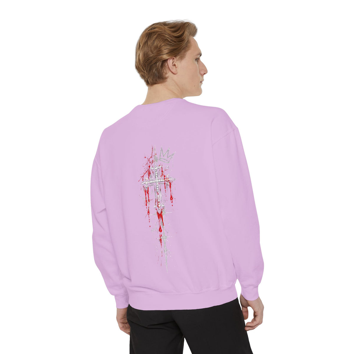 Back of lavender sweatshirt featuring a silver jeweled cross with red blood splatters and a crown motif.