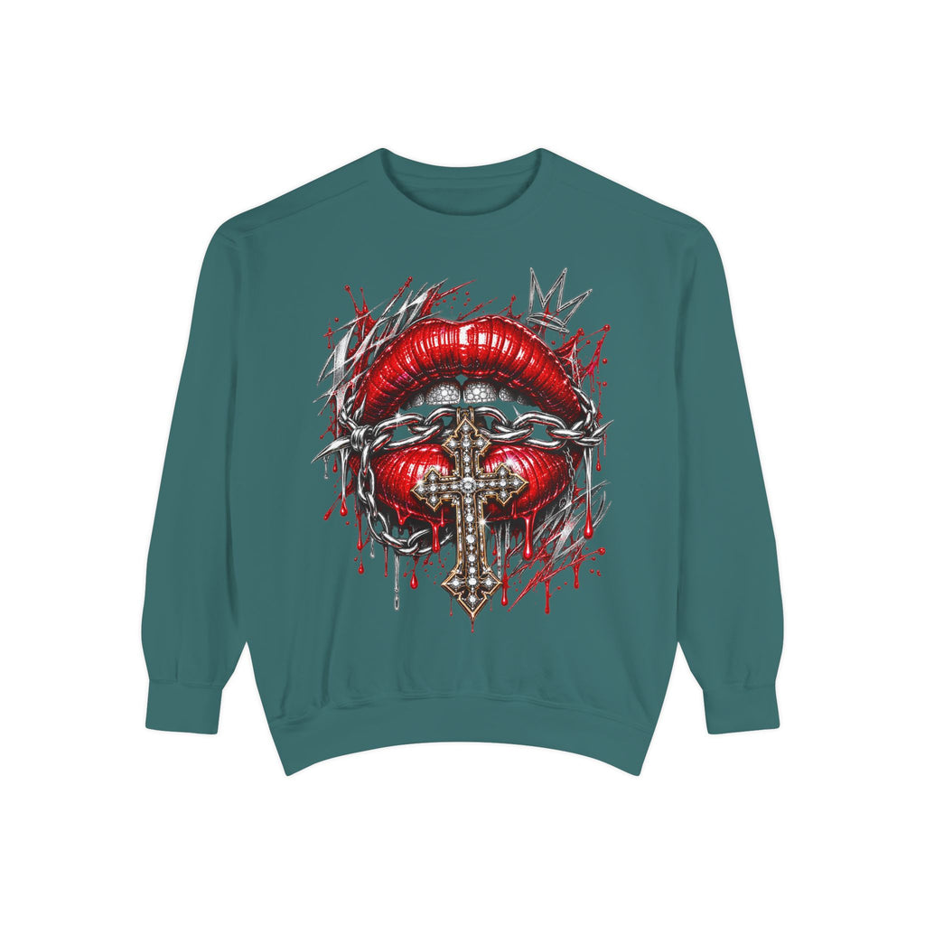 Teal sweatshirt featuring gothic red lips, barbed wire, jeweled cross, and crown motif with dripping blood effect.
