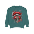 Teal sweatshirt featuring gothic red lips, barbed wire, jeweled cross, and crown motif with dripping blood effect.